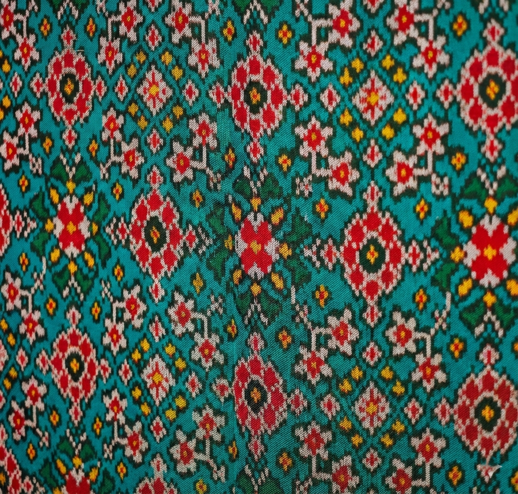 Green Twill Navratna Patola Silk Saree - Green